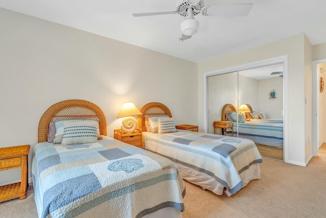 12690 Overseas Hwy Unit 52, Marathon, FL 33050 - bedroom with carpet flooring, a ceiling fan, baseboards, and a closet