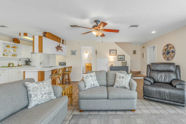 12690 Overseas Hwy Unit 52, Marathon, FL 33050 - living room featuring light tile patterned flooring, baseboards, ceiling fan, and visible vents