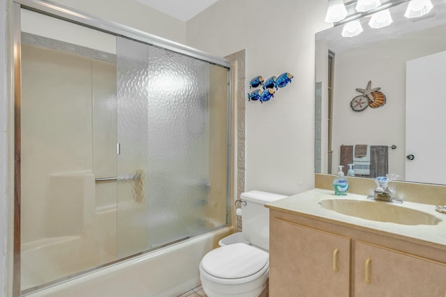 12690 Overseas Hwy Unit 52, Marathon, FL 33050 - full bathroom featuring combined bath / shower with glass door, toilet, and vanity