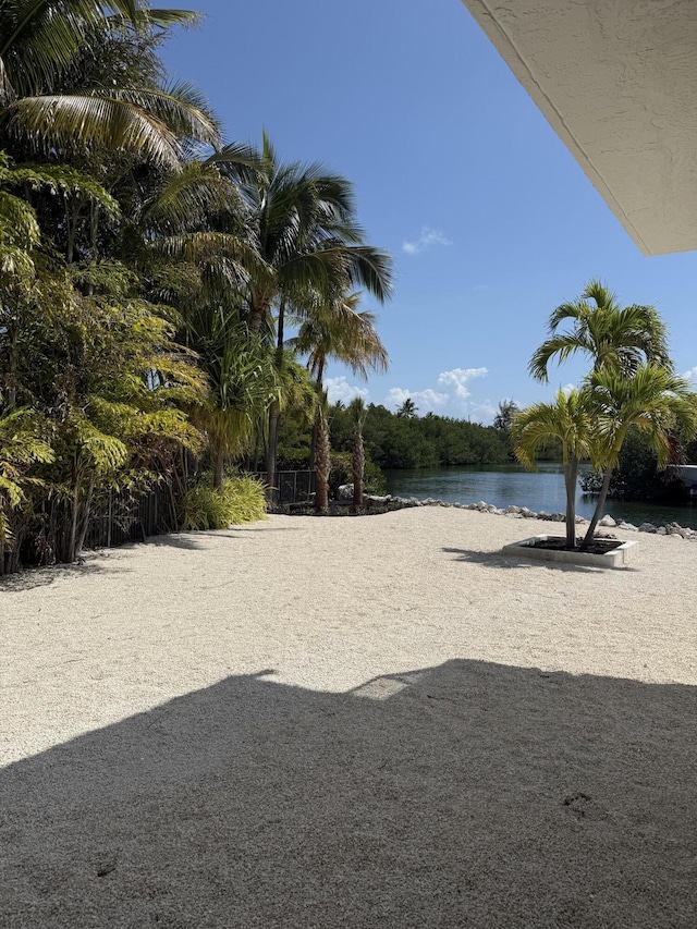 view of yard with a water view