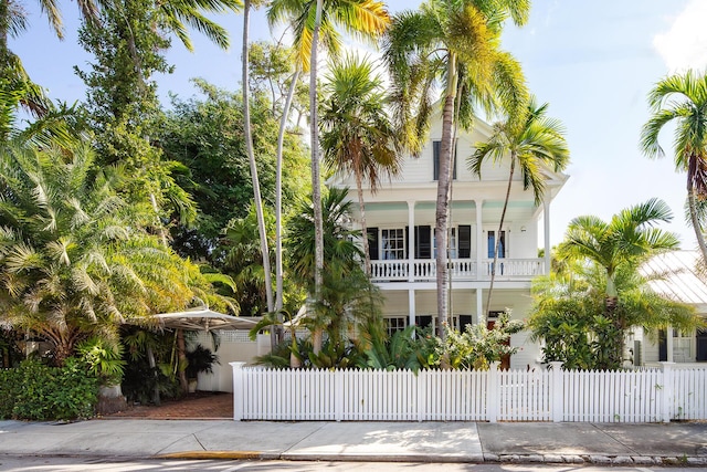 view of front of property with a balcony