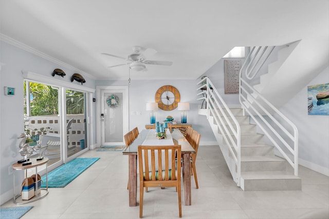 dining space featuring ornamental molding and ceiling fan