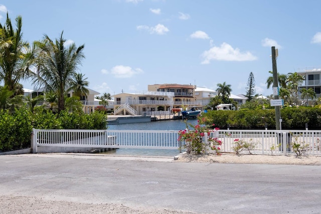 view of pool featuring a water view