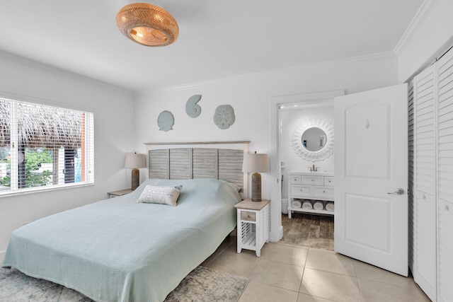 181 Ocean View Dr, Key Largo, FL 33037 - bedroom with crown molding, tile patterned floors, and a sink