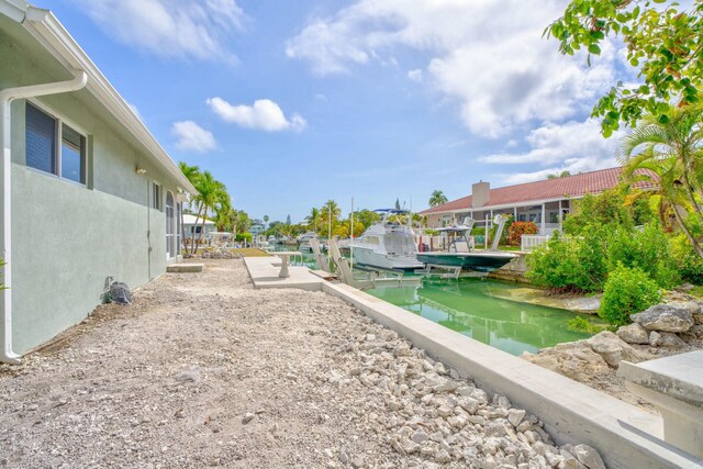 exterior space with a boat dock