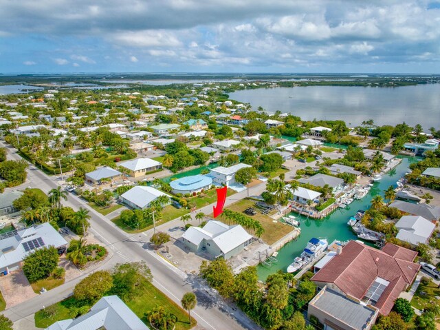 aerial view featuring a residential view and a water view