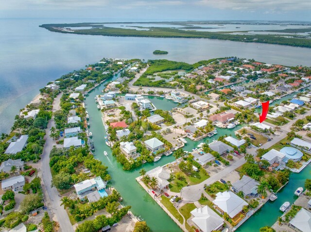 bird's eye view with a water view and a residential view