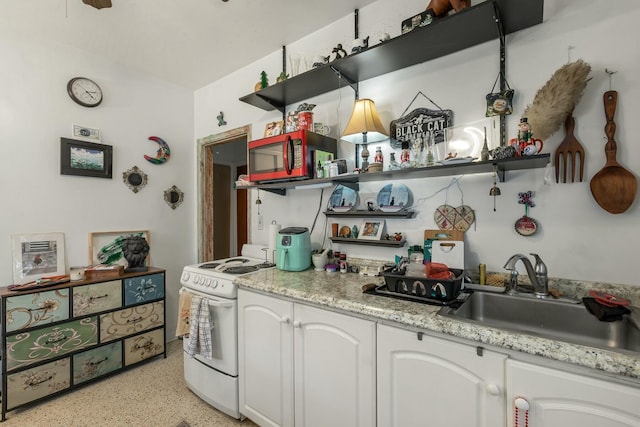 1302 11th St, Key West, FL 33040 - kitchen featuring open shelves, electric range, stainless steel microwave, dark aggregate flooring, and a sink