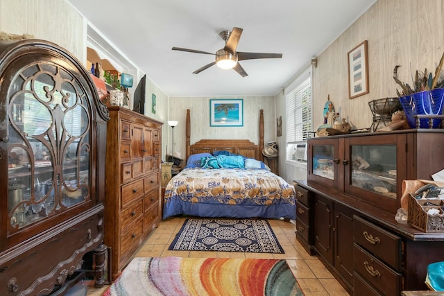 1302 11th St, Key West, FL 33040 - bedroom featuring a ceiling fan and wood walls