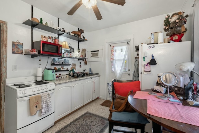 1302 11th St, Key West, FL 33040 - kitchen featuring white appliances, open shelves, a ceiling fan, light countertops, and dark aggregate flooring