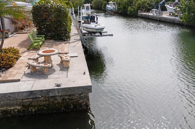 dock area with a water view