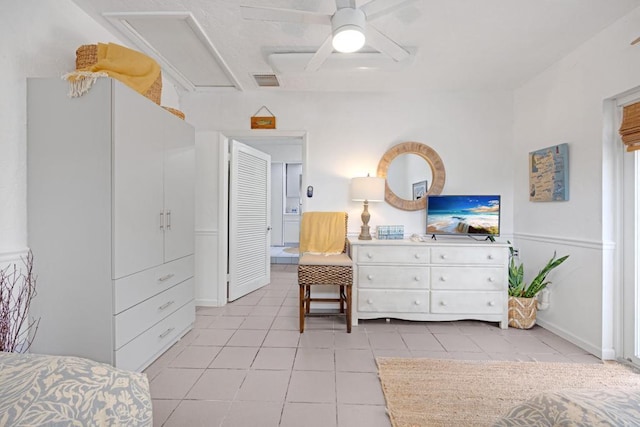 bedroom with light tile patterned flooring and ceiling fan