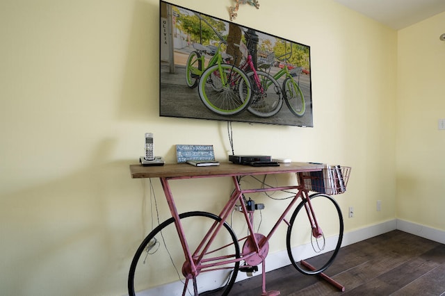 interior details with wood finished floors and baseboards