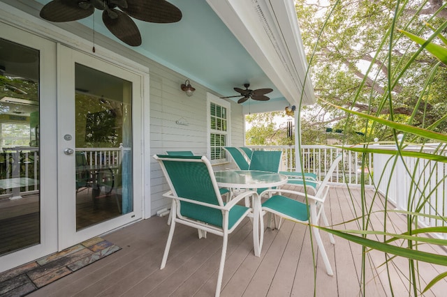 wooden deck with french doors and ceiling fan