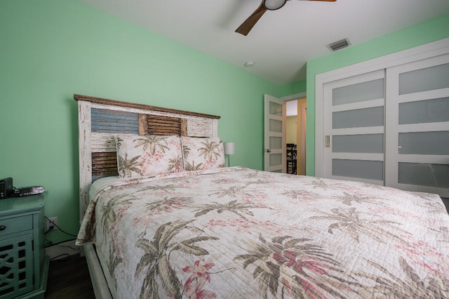 bedroom featuring visible vents, a closet, and ceiling fan