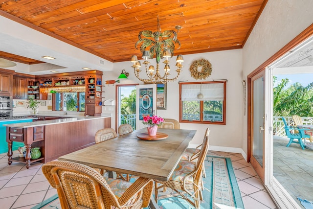 4500 Filer Cove Rd, Big Torch, FL 33042 - dining area with plenty of natural light, wood ceiling, light tile patterned floors, a chandelier, and baseboards