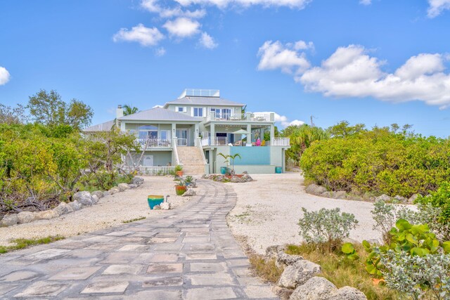 4500 Filer Cove Rd, Big Torch, FL 33042 - coastal home with a balcony and stairway