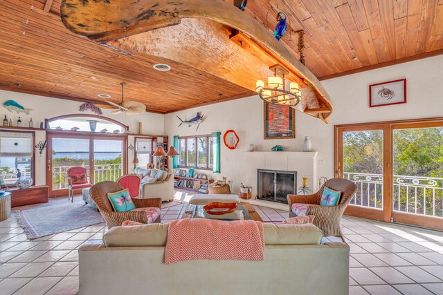 4500 Filer Cove Rd, Big Torch, FL 33042 - living area with wood ceiling, tile patterned flooring, a fireplace, a ceiling fan, and ornamental molding