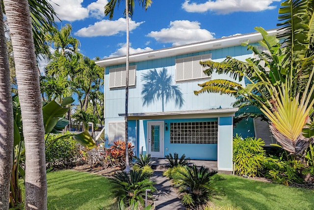 view of front of home with a front yard