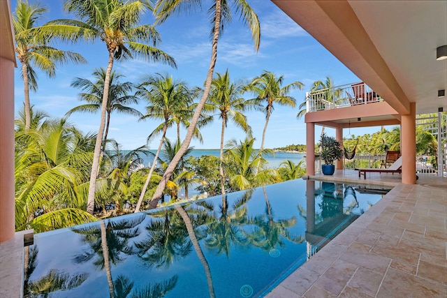 100 List St, Islamorada, FL 33036 - view of pool with a patio area and a water view