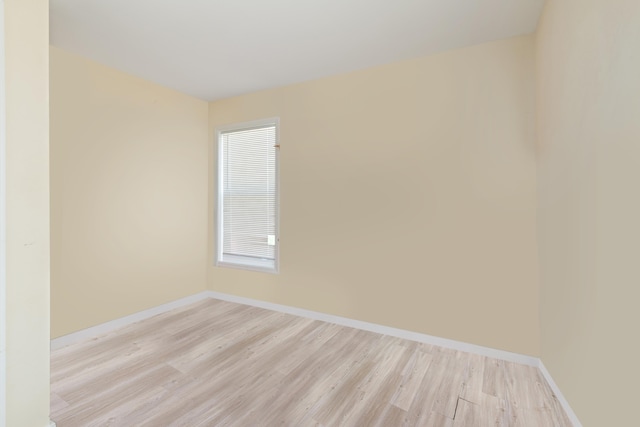 unfurnished room featuring light hardwood / wood-style flooring