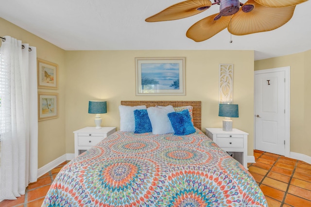 tiled bedroom with ceiling fan