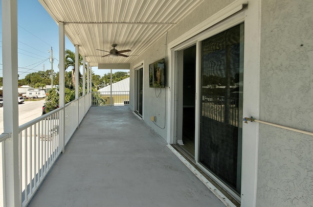 view of patio featuring ceiling fan