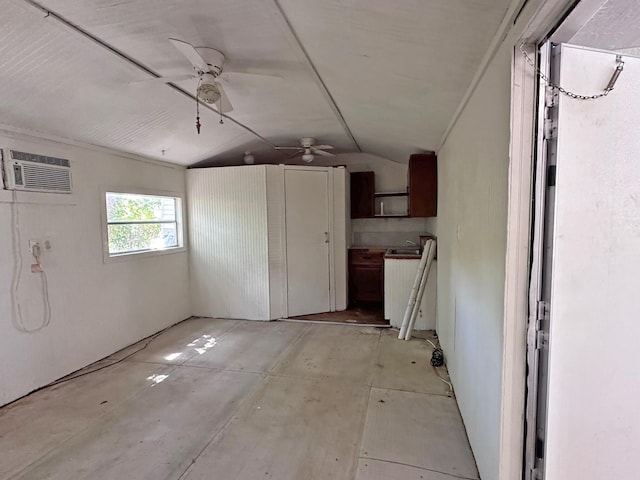 basement with ceiling fan and a wall mounted air conditioner