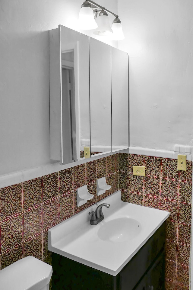 half bath with toilet and vanity