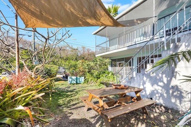 view of yard featuring stairway