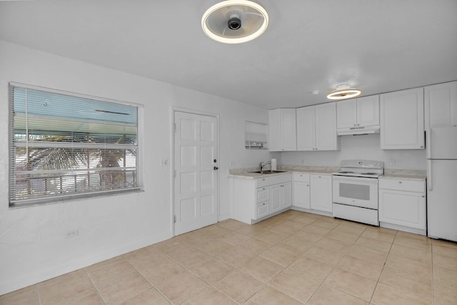 kitchen with under cabinet range hood, white appliances, a sink, white cabinetry, and light countertops