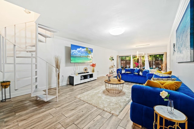 living room with baseboards, stairway, wood finished floors, and crown molding