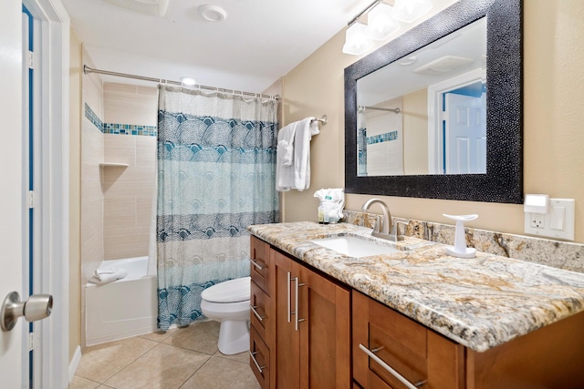 full bathroom with shower / bath combo, vanity, tile patterned floors, and toilet