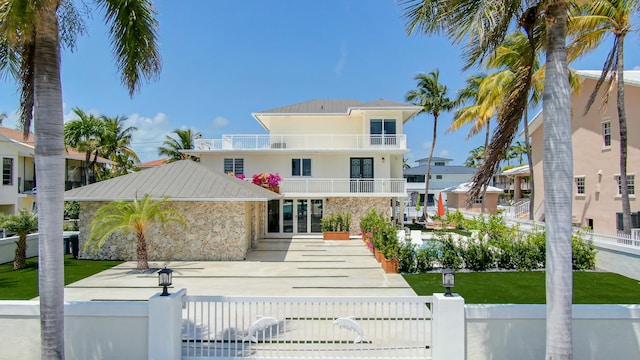 back of house with a balcony