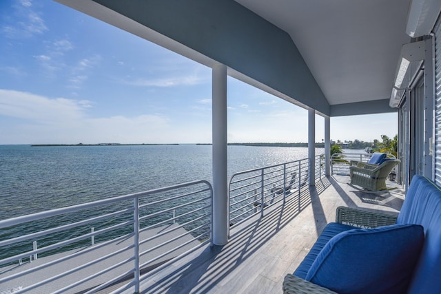 balcony featuring a water view