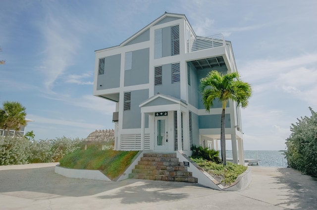 coastal inspired home with a water view