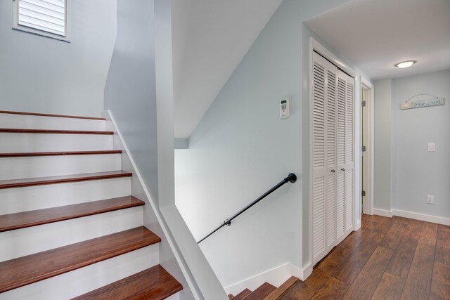 stairs with wood-type flooring