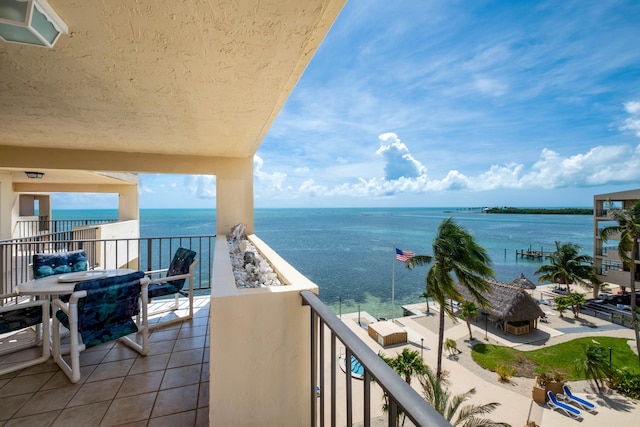 balcony featuring a water view