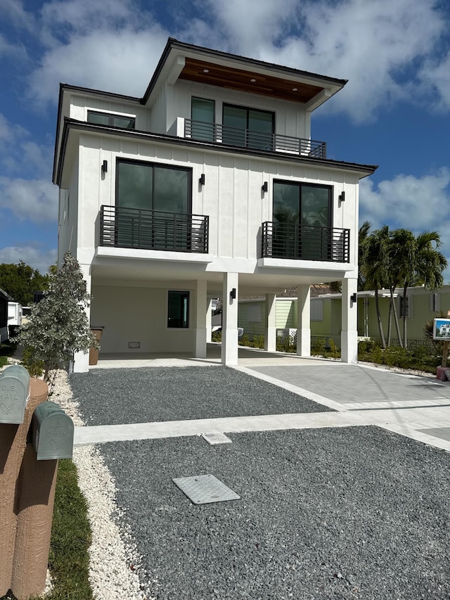 view of front of home with a balcony