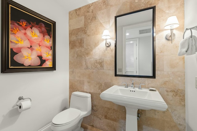 3841 N Roosevelt Blvd Unit 315, Key West, FL 33040 - bathroom with tile walls and toilet