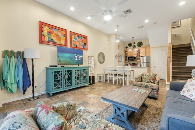 living room with ceiling fan