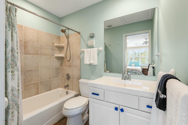 full bathroom featuring vanity, toilet, and shower / tub combo