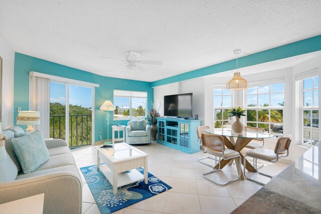 500 Burton Dr Unit 1316, Tavernier, FL 33070 - tiled living area featuring a textured ceiling and ceiling fan
