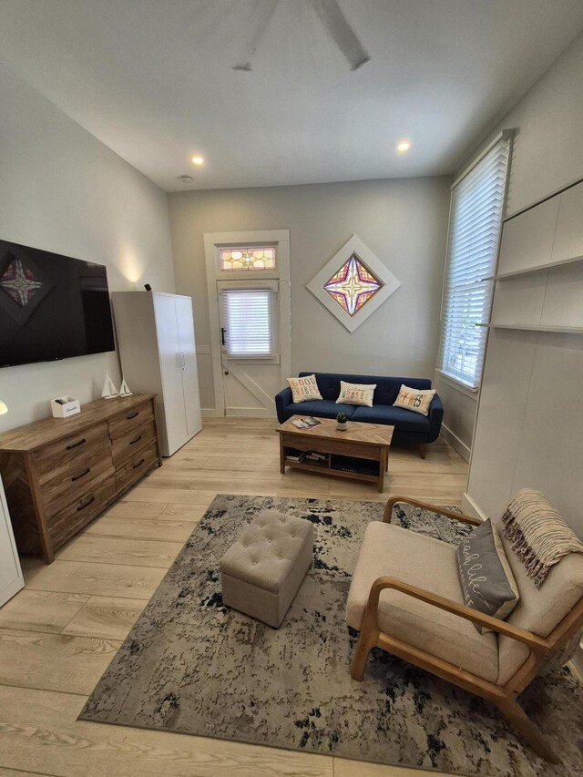 1220 Newton St Unit 1, Key West, FL 33040 - living room with light wood finished floors, plenty of natural light, and recessed lighting