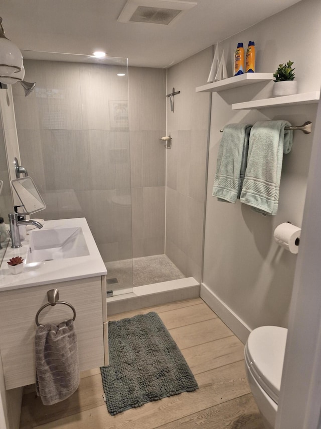 1220 Newton St Unit 1, Key West, FL 33040 - full bathroom featuring a walk in shower, vanity, wood finished floors, and recessed lighting