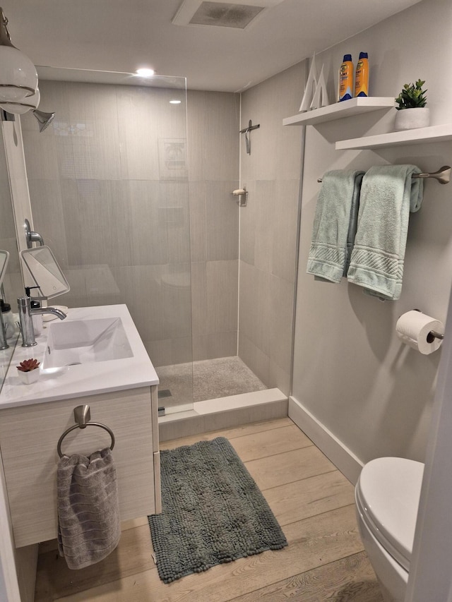 1220 Newton St Unit 1, Key West, FL 33040 - bathroom featuring walk in shower, wood finished floors, vanity, and recessed lighting