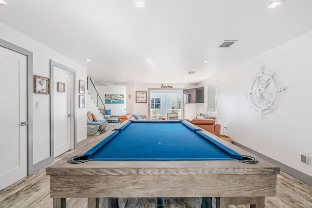 playroom with light hardwood / wood-style flooring and billiards