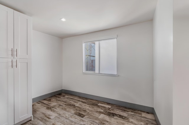 empty room featuring light hardwood / wood-style floors