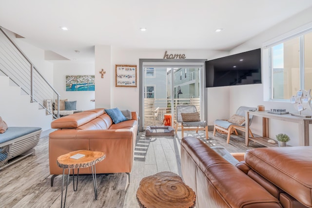 living room with light hardwood / wood-style floors