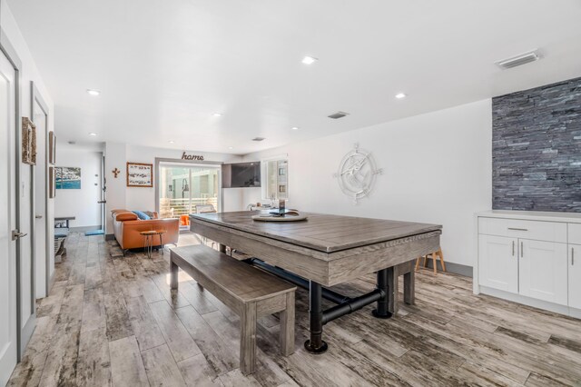 dining area with light hardwood / wood-style flooring